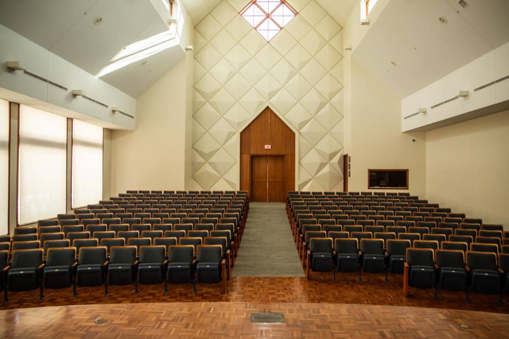 Image 1 of 9 A view of the Cook-DeWitt auditorium from the stage.